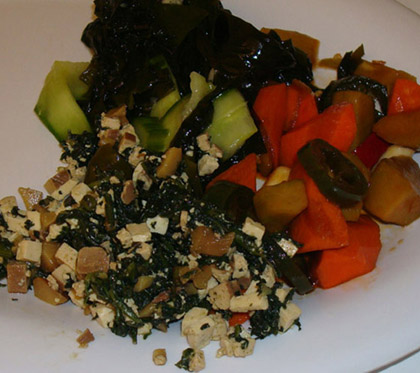 Cucumber-seaweed salad, assorted vegetable kimchee, and chrysanthemum greens with tofu.
