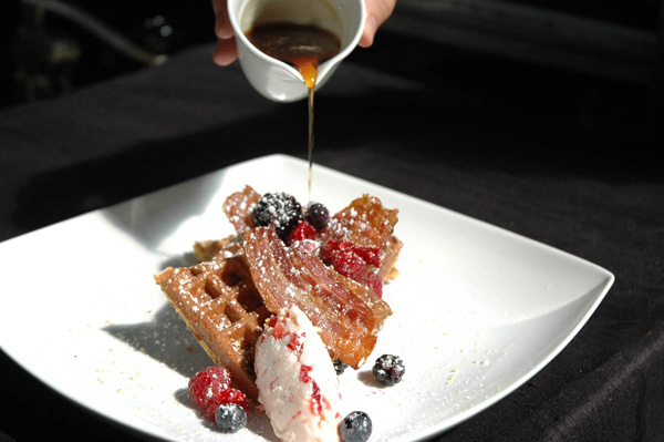 Cornmeal waffle with apple-smoked bacon (Photo by Mark Leet Photography)