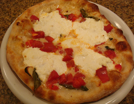 Pizza Pomodoro with ricotta, post-baking
