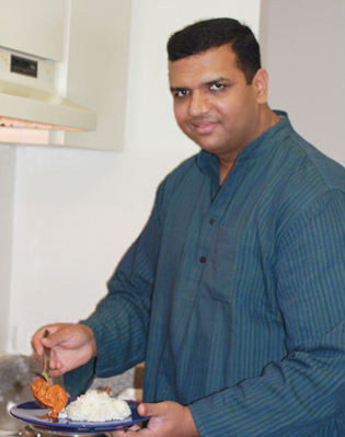 Executive Chef Vittal Shetty cooks in his home kitchen.