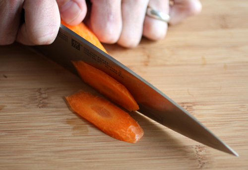 Making slices by cutting at a sharp angle.