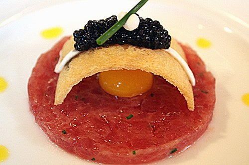 Caviar, ahi, quail egg, and a crispy arch of brioche.