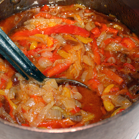 Piperade Basquaise -- a stew of red bell peppers, onions, garlic, coriander, and paprika.