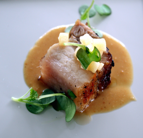 Kevin's grilled pork belly with pickled apples and a zippy peanut sauce.