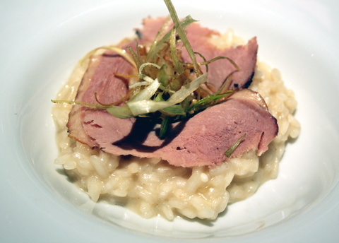 Risotto with smoked duck and fried leeks.