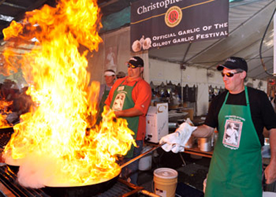 Cooking up garlicky calamari at the Gilroy Garlic Festival. (Photo courtesy of the festival)