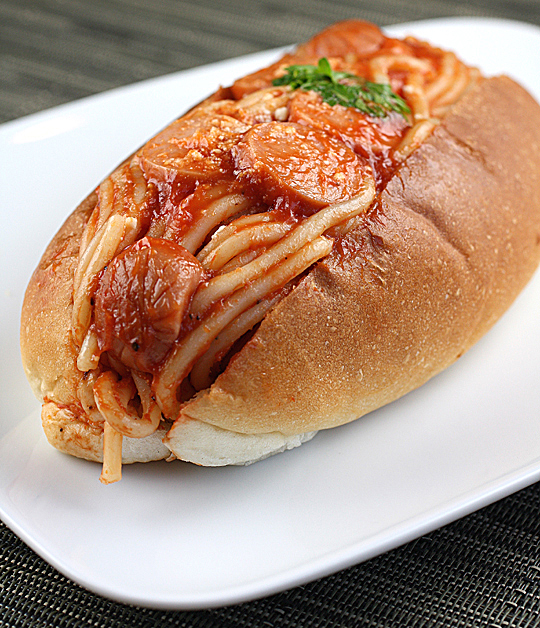 Yes, that is spaghetti in a hot dog bun. Find it only at Clover Bakery.