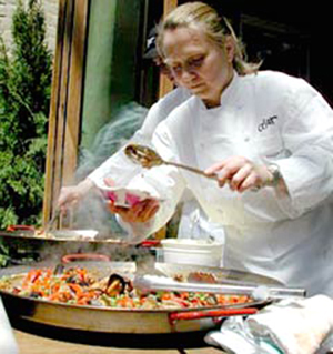 Maggie Pond of Cesar in Berkeley, making paella at a past "Spice of Life Festival.'' (Photo courtesy of the North Shattuck Association)