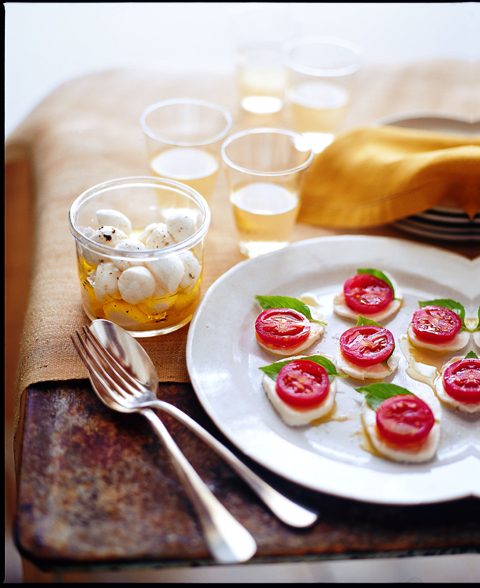 Buffalo mozzarella, summer tomatoes and the perfect wine. (Photo courtesy of Chronicle Books) Buffalo mozzarella, summer tomatoes and the perfect wine. (Photo courtesy of Chronicle Books)