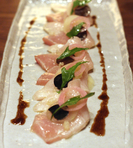 Hamachi done crudo-style with crisp tangy green apple and earthy truffles.