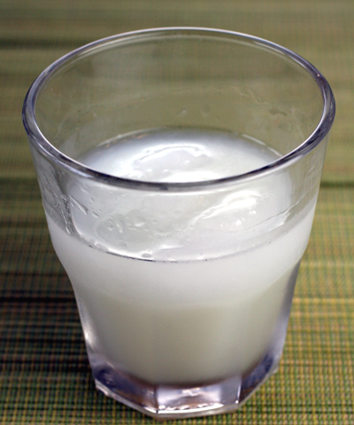 Mixed with ice to create the distinctive milky appearance.