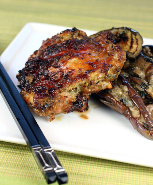 Serve the chicken with grilled eggplant flavored with fish sauce, sesame oil, black vinegar and fresh Thai basil.