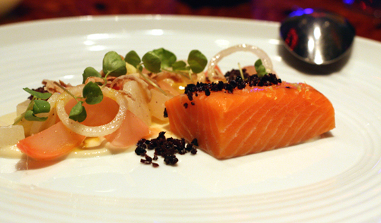 King salmon with young almonds and black olives.