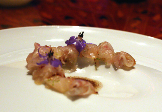 Sea bream sashimi with aleppo pepper.