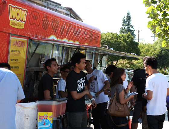 The WOW Truck draws a crowd as the "Eat St.'' crew films the scene.