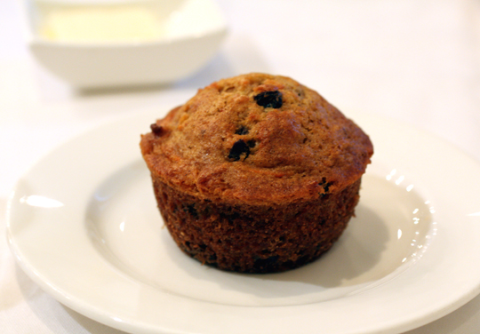 A Morning Glory muffin studded with carrots and raisins.