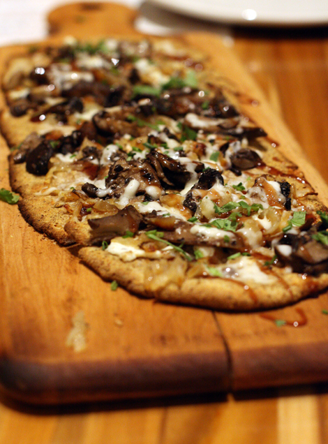 A drizzle of pomegranate balsamic vinegar makes this flatbread something extra special at LYFE Kitchen.