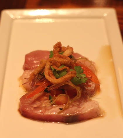 Seared hamachi with zingy pickled onions.