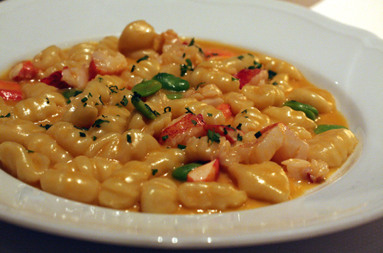 Tender gnocchi with chunks of lobster in a dazzling shellfish-infused sauce.