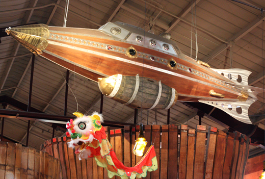 A New Year's dragon vies for space with a spaceship. 