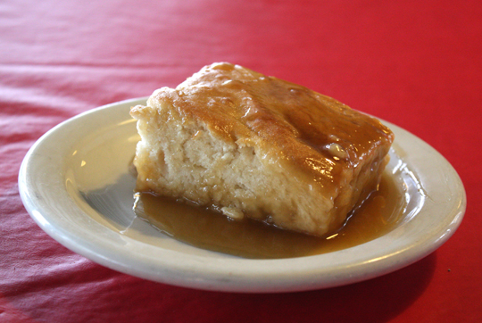 Pouding Chomeur -- white cake soaked in warm maple syrup.