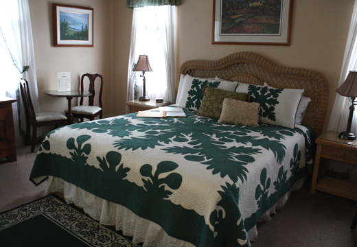 The bedrooms are adorned with handmade Hawaiian quilts.