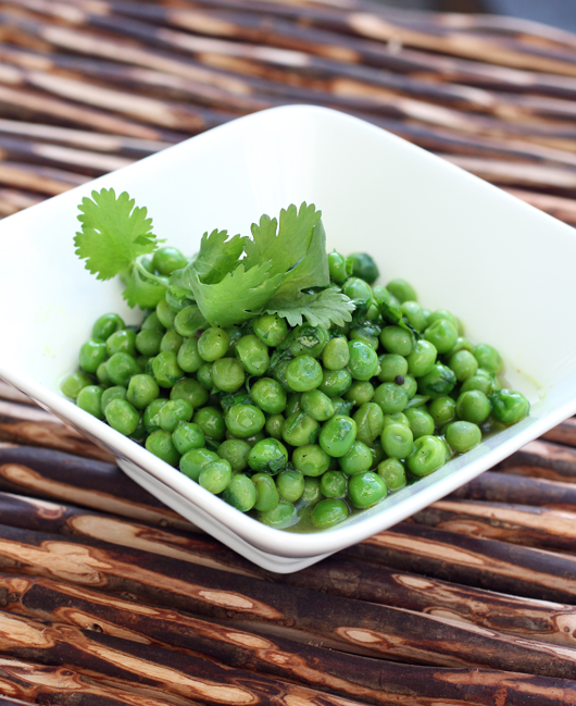 A simple bowl of peas with a punch of flavor.