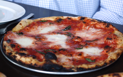 A classic tomato, basil and mozzarella pizza.
