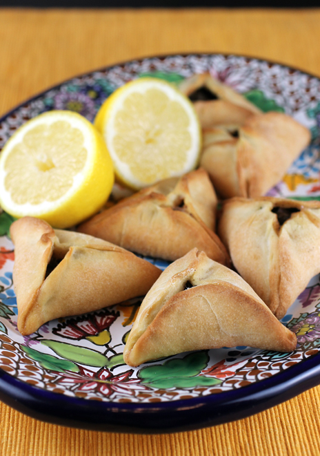 Golden turnovers filled with sumac-flavored spinach for your holiday entertaining.