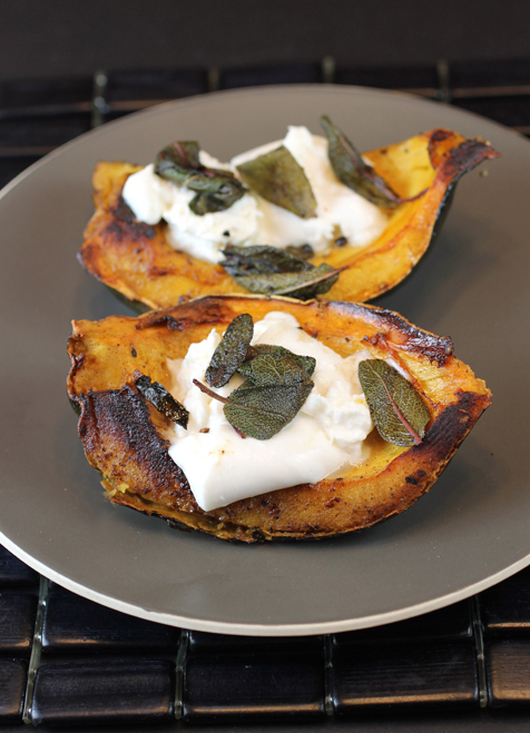 Roasted acorn squash wedges topped with rich, creamy burrata.