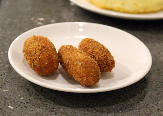 Crisp croquetas filled with bacalao.