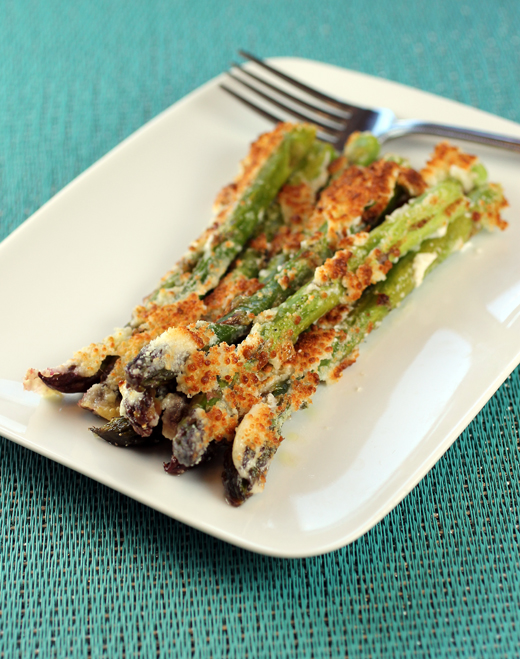 Asparagus spears get broiled with mayo and grated cheese.