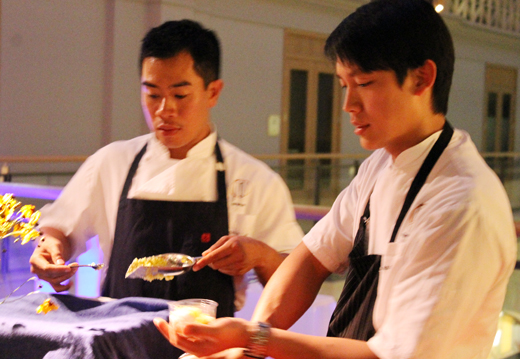 Francis Ang (right), pastry chef of the Fifth Floor, putting the finishing touches on a black tea cremeux with calamansi ice and menthol espuma...