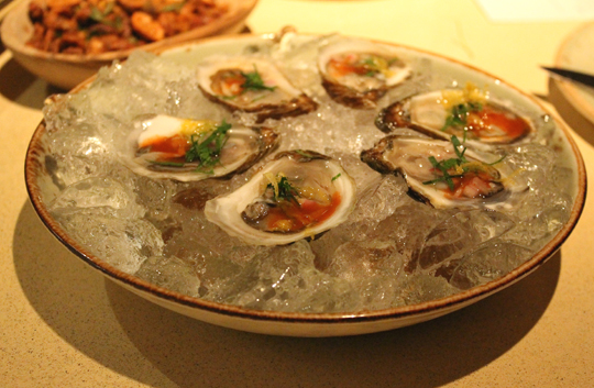 Oysters with house-made hot sauce.