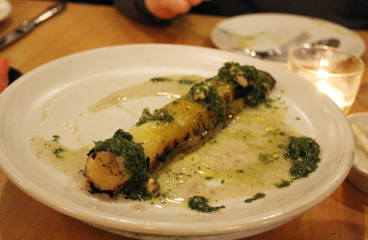 A charred leek with oysters.
