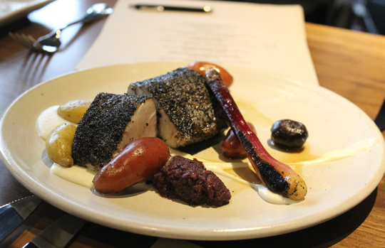 Kingfish with fingerlings and black trumpet mushrooms.