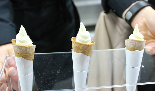 Course #32: Onion. They look like little ice cream cones. But what's inside is actually an onion soft-serve.