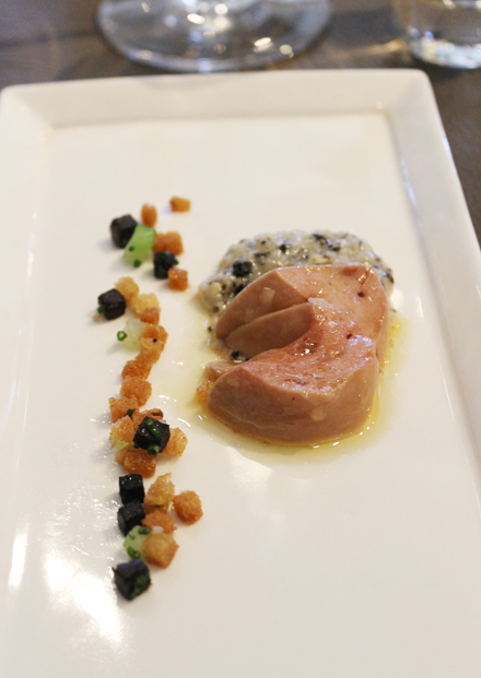 Slow-roasted foie gras with sweet corn, black truffle, celery and rye crumbs by Chef Ken Frank.