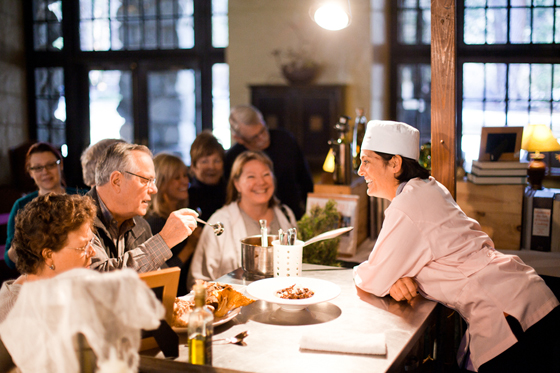Chef Ariane Duarte of "Top Chef'' fame talks with attendees at a previous Chefs' Holidays cooking demo. (Photo courtesy of the Ahwahnee)