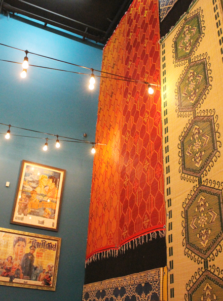 Colorful mats as wall art.