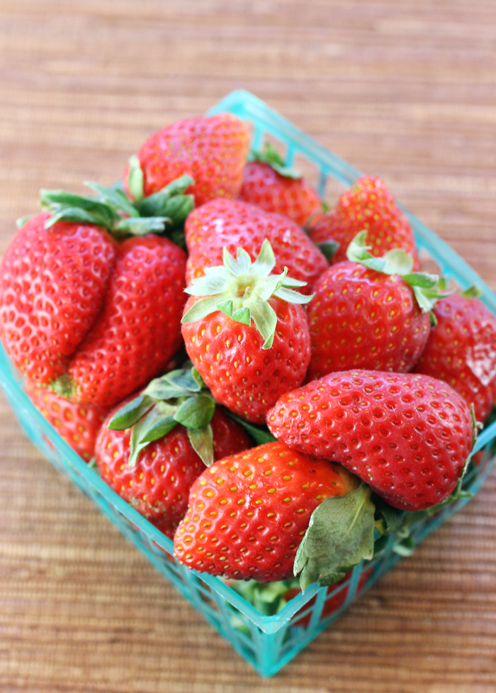 Strawberries from the farmers market in their iconic basket.
