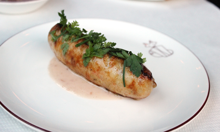 A plump seafood sausage.