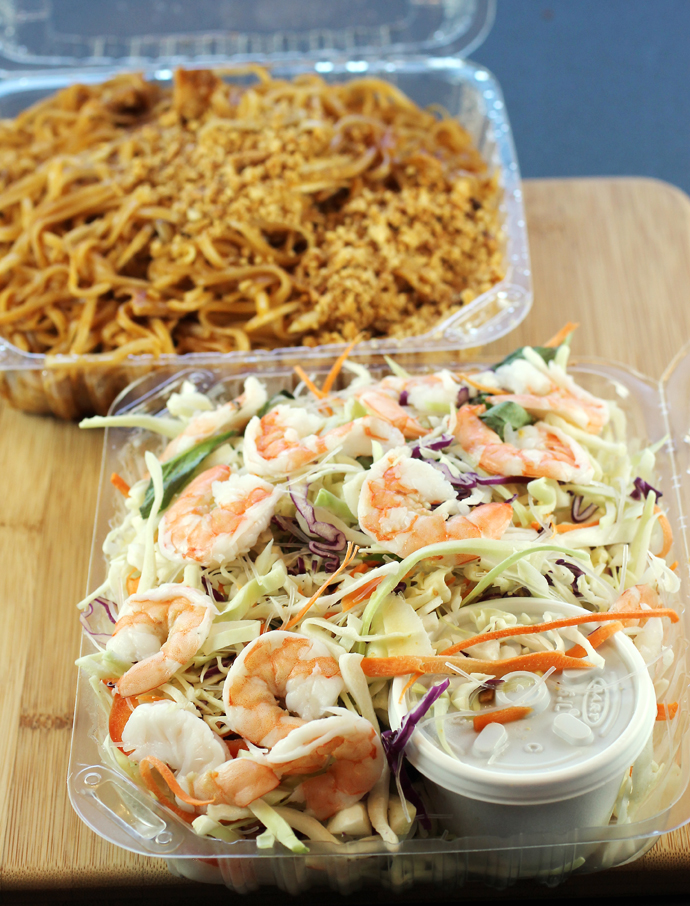 Tamarind noodles (back) and a vibrant salad of shrimp, cabbage, noodles and peanuts -- all delivered right to my door.