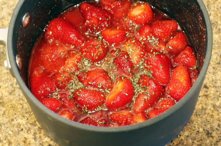 Macerated berries mixed with rosemary.