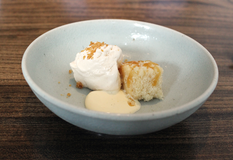 A square of sesame cake with basmati ice cream.