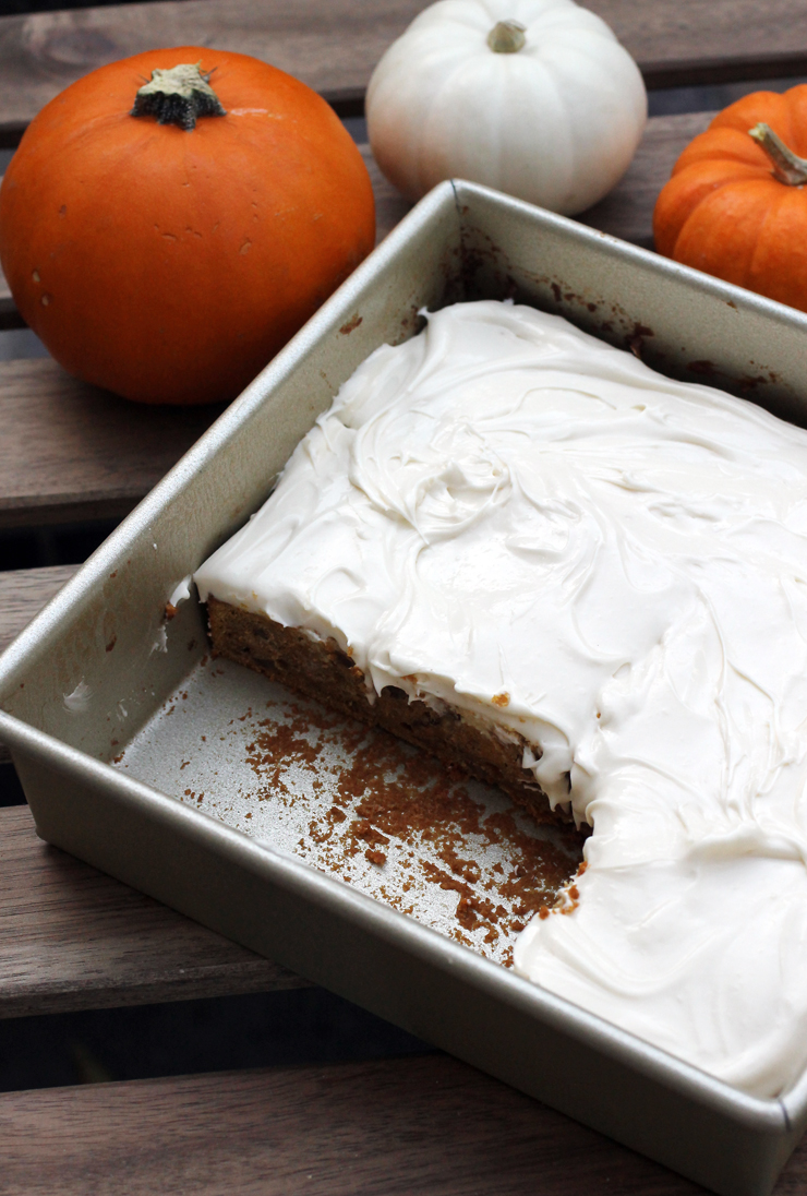Pumpkin spice bars with a cloud of fluffy, marshmallow-y cream cheese frosting.