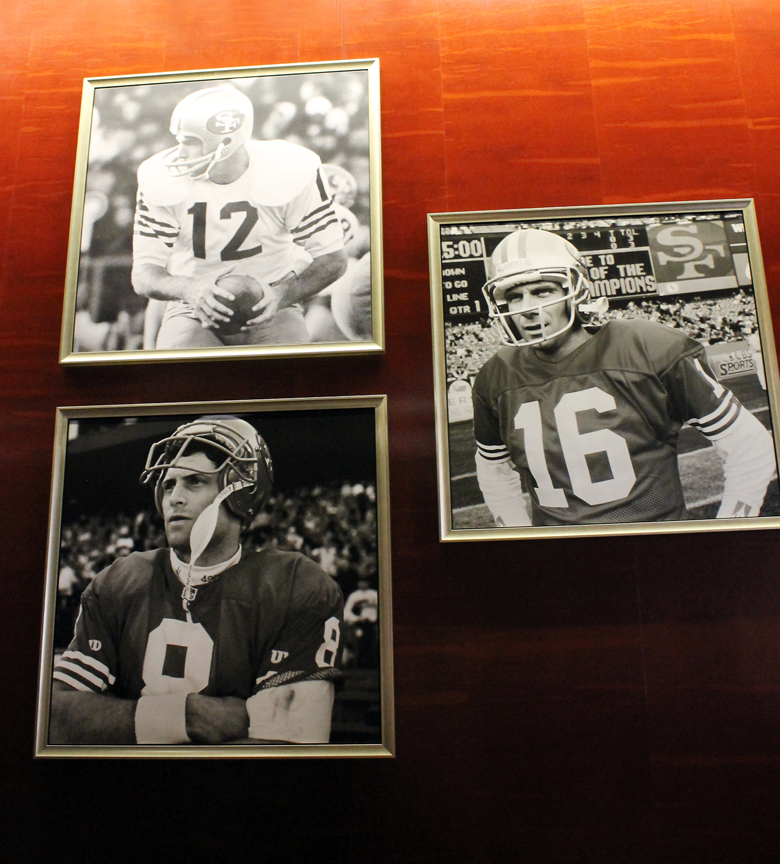 The greats on the wall at the BNY Melon Club West at Levi's Stadium.