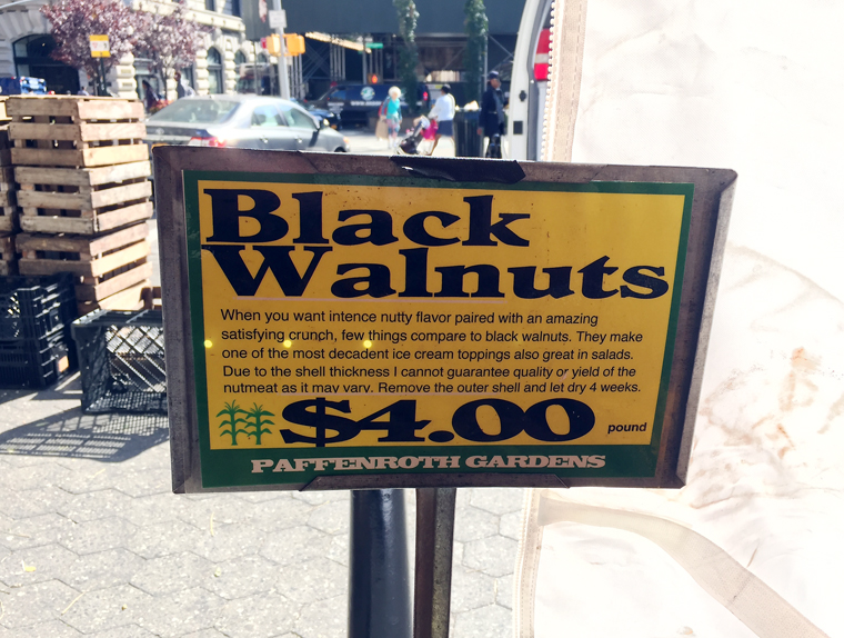 Another stand selling black walnuts.