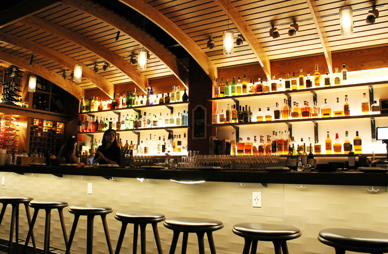 The bar with its wine barrel-like ceiling.