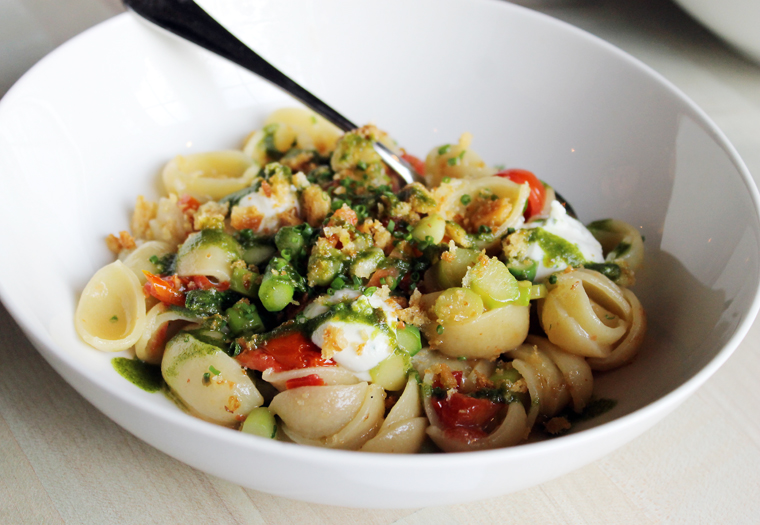 Orecchiette with asparagus and roasted tomatoes.